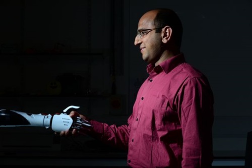 PAY-Dr-Ravinder-Dahiya-with-Robotic-hand-with-electronic-skin