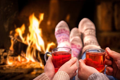 Mulled wine at romantic fireplace