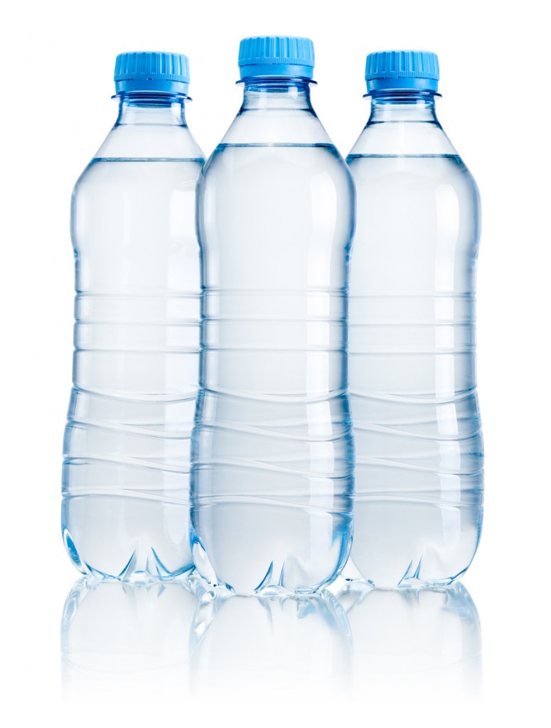 Three plastic bottle of drinking water isolated on white background