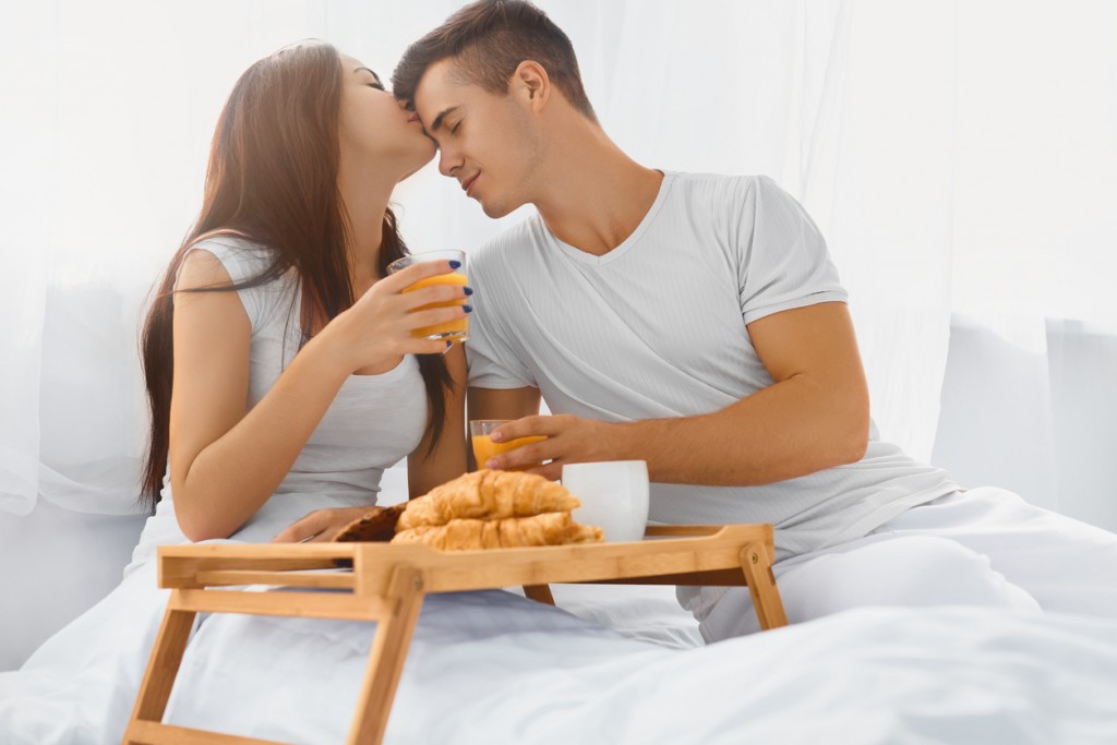 Couple eating breakfast in the morning