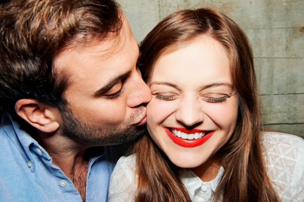 PROD-Young-man-kissing-woman-on-cheek