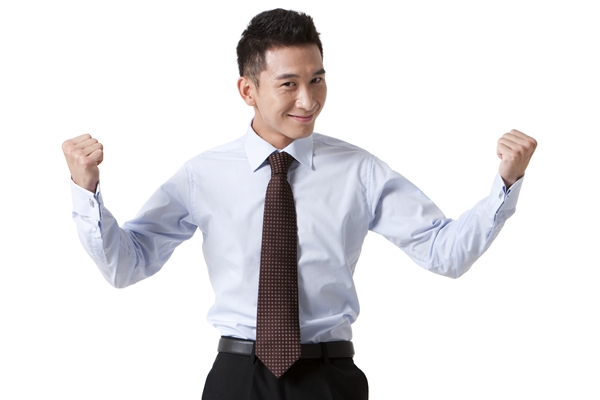 Portrait of a Chinese businessman flexing