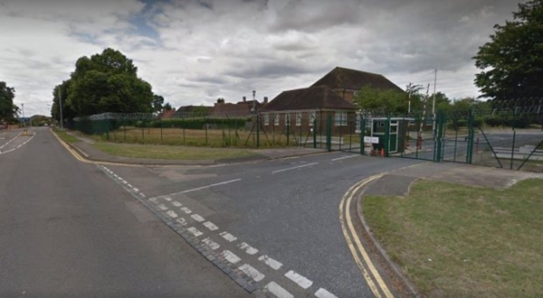 Man armed with knife drives at children near army barracks