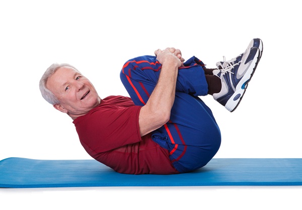 Portrait Of Senior Man Exercising