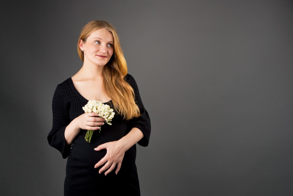 pretty young pregnant blonde woman